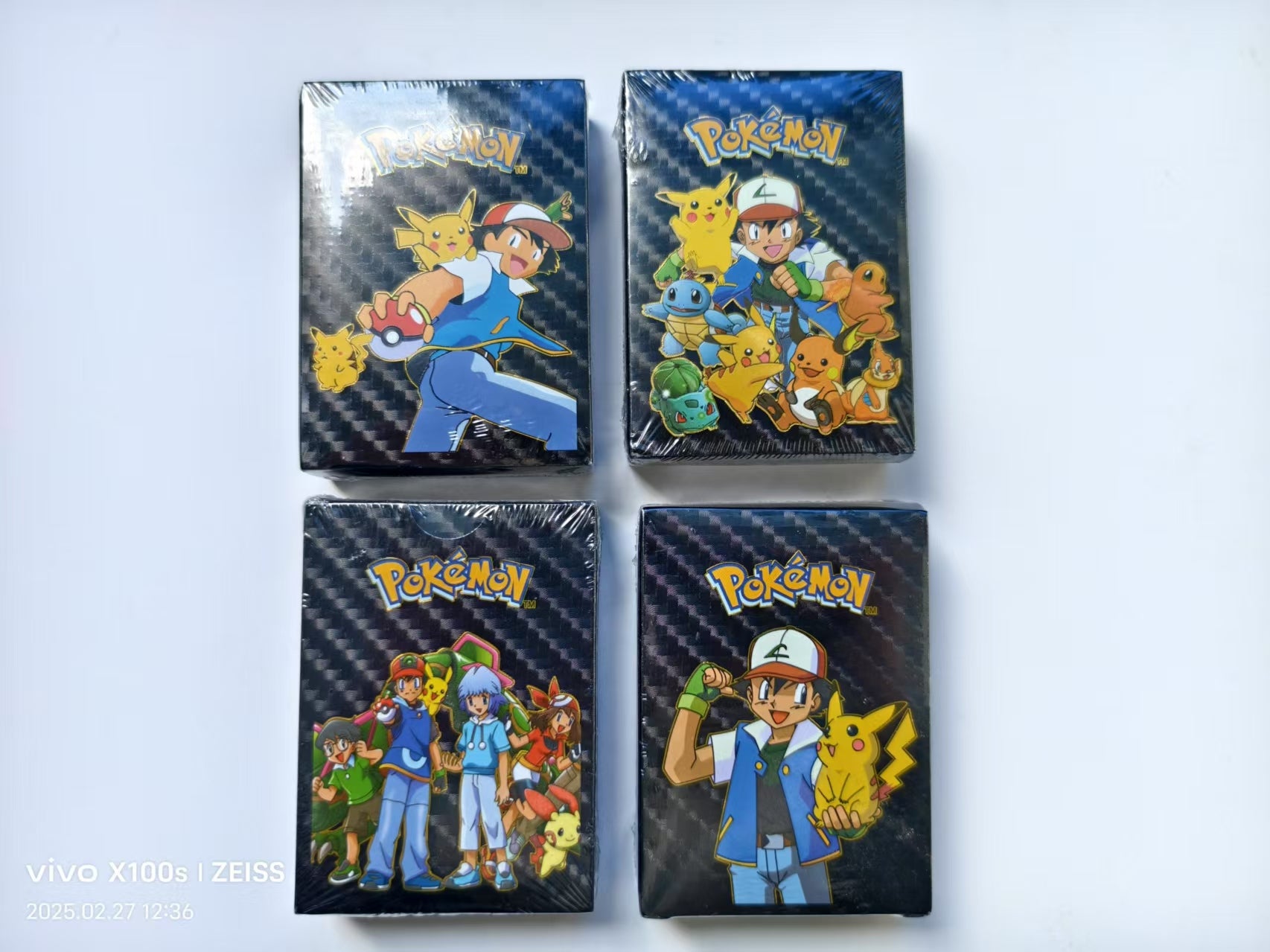 Limited edition Pokémon cards collection featuring four themed boxes with popular characters and Pokémon.